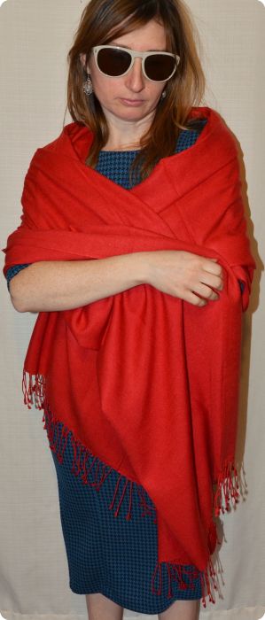 Empar is wearing a fullsize Ama Dablam shawl in Jester Red (#ADft-242)
