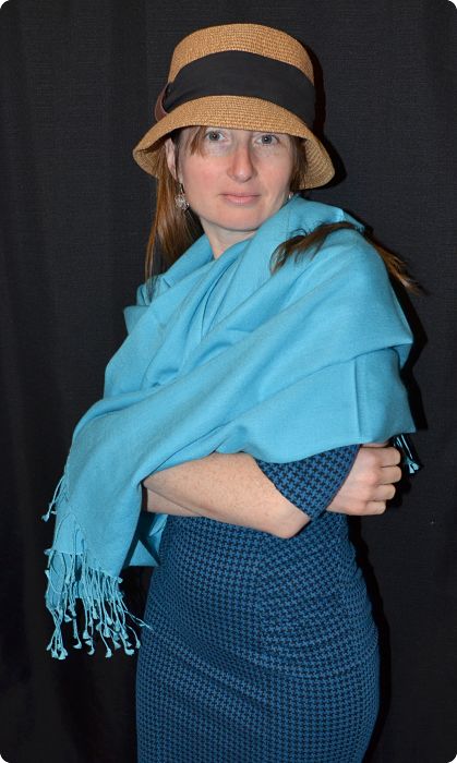Empar is wearing a light turquoise 70% pashmina 30% silk Ama Dablam shawl