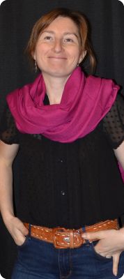 Empar is wearing a medium size Ama Dablam shawl in Raspberry (#ADmt-047D)