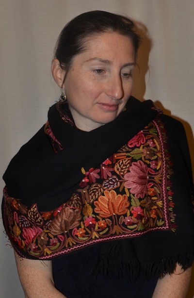 Empar is wearing a stunning Shalimar Gita shawl, black with full surface hand-stitched embroidery