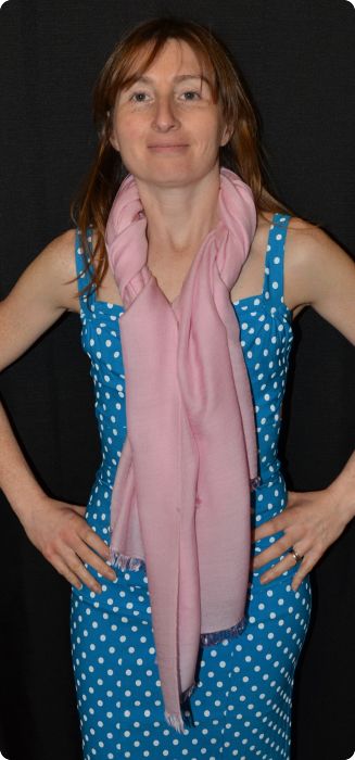 Empar is wearing a medium size Ama Dablam shawl in Coral Blush (#ADmr-043L) 