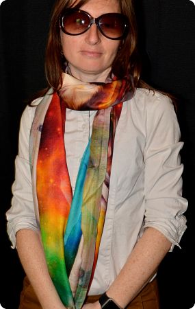 Empar is wearing a colorful Ranghi-Tanghi modal shawl, woven from  semi-synthetic modal yarn derived from broken down and reconstituted plant cellulose