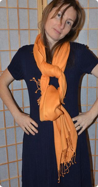 Empar is wearing a fullsize Ama Dablam shawl in Russet Orange (#ADft-076)