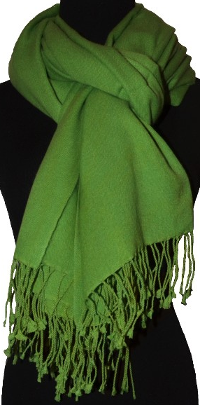 Empar is wearing a fullsize Ama Dablam shawl in Classic Green (#ADf-011)