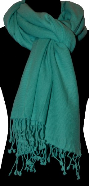 Empar is wearing a full size Sagarmatha shawl in Turquoise, SFT-71L